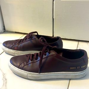 Burgundy Common Projects Sneakers